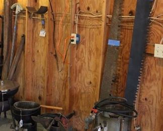 TWO VINTAGE CROSS CUT SAW BLADES, AND 4 PROPANE COOKERS