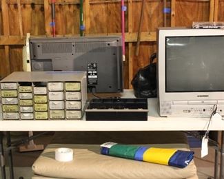 COIN STORAGE BOX AND TELEVISION WITH BUILT IN DVD PLAYER