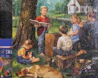 PUZZLE THATS PUT TOGETHER, (THE SARAN WRAP DISTORTS THE BEAUTY OF THESE PUZZLES)