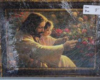 PUZZLE THATS PUT TOGETHER, (THE SARAN WRAP DISTORTS THE BEAUTY OF THESE PUZZLES)