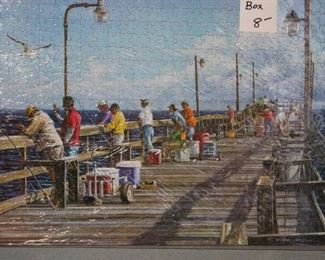 PUZZLE THATS PUT TOGETHER, (THE SARAN WRAP DISTORTS THE BEAUTY OF THESE PUZZLES)