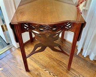 $140 -Baker  Chippendale style drop leaf table.  28"H x 23 1/2"W x 24 1/2"D; 2 leaves 9 1/2" each