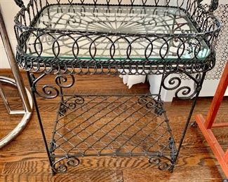 $120 - Wrought iron  stand with removable serving/beverage  tray; 23"H x 19 1/2"W x 14"D