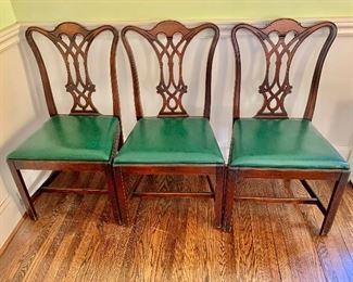 $600 - 4 Chippendale style chairs with green seats; 38"H x 21"W x 18"D. Height to seat 18". Wear consistent with use and age.
