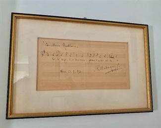 $495 - Original antique musical passage signed by Pietro Mascagni; Italian composer (1893-1945); Dated Wien 1924; Musical passage from "Cavalleria Rusticana"; Framed under glass; Very good condition; Framed size 8 3/4"H x 13"W 