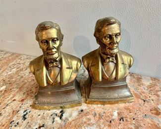 $40 - PMC brass Abraham Lincoln book ends; 5"H x 3 1/4"W x 2 1/4"D