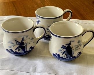 $18; set of 3 handpainted Delft Blue, cups; 3"H x 5"W 