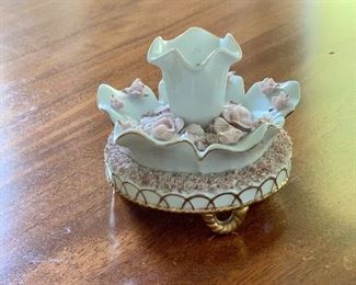 $30 - Antique porcelain footed candlestick holder with pink roses and gold trim; 3 1/2"H x 4" diameter 