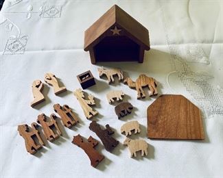 $20 - Miniature wood nativity set; 5"H x 5 1/4"W x 2"D 