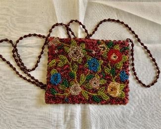 $20 - Vintage beaded pocket purse with beaded strap; 26"L including strap. Purse measures  4"H x 5"W 