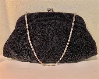 $24 - Black beaded evening bag; 10 1/2"L x 8 1/2"W 