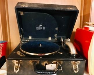vintage hand crank record player.  Works and we have the crank!