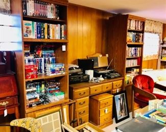 Many VCR and DVD tapes, printer, sewing cabinet, two very nice wood book cases