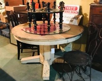 large round table.  Unique ornate cherub coffee table with glass top