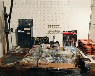 bags of nails, screws, tins of nails, tools