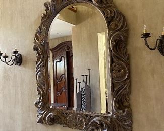 Large hand cut wood frame mirror made in Mexico. 