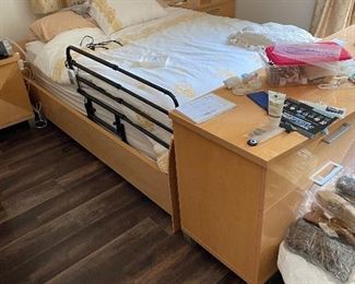 Mid century style bed frame modified for assisted living. There is also a curved headboard in the same style as the footboard in the garage. Couldn’t fit in room. Dressers and curtains go too
