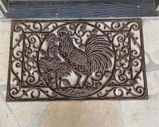 Iron welcome mat with a rooster