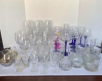 This is a collection of assorted glassware featuring wine glasses, shot glasses and whiskey glasses. https://ctbids.com/#!/individualEstateSales/316/9887