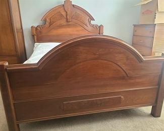 Oak Carved bed frame and full size posture perfect mattress. Frame is lovely carved out with curving lines and framing leafs. Etchings on headboard post top and sides. Measures 61" x 79" x 57". https://ctbids.com/#!/individualEstateSales/316/9887