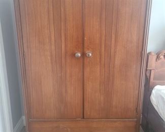 Vintage wardrobe closet is fully lined in cedar. Cabinet features double doors and is in decent condition. Measures 40" x 21" x 65". https://ctbids.com/#!/individualEstateSales/316/9887