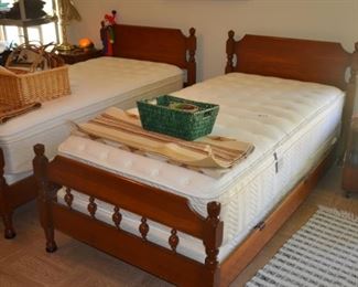 Cherry Wood Twin Beds showing Footboards