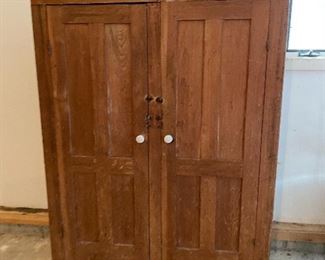 Primitive pine armoire