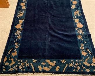 Antique Chinese wool rug