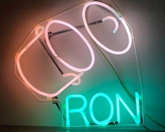 VINTAGE "RON" NEON SIGN | Depicts a lidded jar in pink over "Ron" in green; 17-1/2 x 16-1/2 in. 