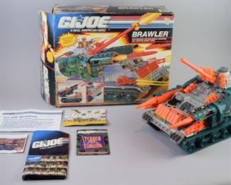 4	GI Joe Brawler	A GI Joe Brawler tank toy (circa 1991), complete with all parts, box and manuals and paperwork. Fine condition, box has wear consistent with its use and age.
