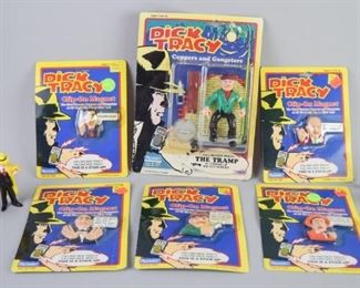 9	Grouping of Dick Tracy Action Figures	A grouping of Dick Tracy action figures and clip-on magnets (4 magnets carted, 1 action figure carted in box.) There are also 4 loose action figures, two of Dick Tracy and two villains. Good condition overall.
