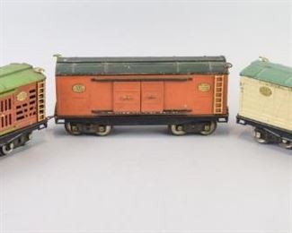 27	Group of Lionel Lines Train Cars	A grouping of Lionel Line train cars. These include: No. 214R Refrigerator Car No. 213 Cattle Car No. 214 Freight Car Good condition with obvious usage from over years of play.
