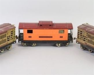 30	Grouping of Lionel Train Cars	A grouping of Lionel Lines train cars. These include: 2 No. 213 cattle cars 1 orange colored caboose, No. 217A Very good condition.
