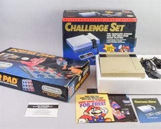 34	Nintendo Challenge Set and Power Pad	Nintendo Challenge Set in original box, with console, controllers and game; and a Power Pad with game, in original box.
