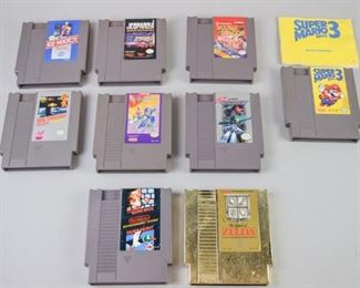 36	Grouping of Nintendo NES Games Game Paks	A grouping of 9 different Nintendo Entertainment System Game Paks (cartridges). Titles include Super Mario Brothers 3 (with manual), Jeopardy, Double Dragon, Ice Hockey, Metroid, Mega Man 4, Gradius, Super Mario Bros/Duck Hunt, and the Legend of Zelda. All are in good condition, labels are intact with only some cosmetic wear on the cartridges.
