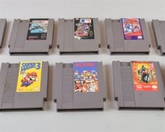 40	Grouping of NES Games Including Blades of Steel	A grouping of 10 Nintendo Entertainment System Game Paks. These include Tetris with game sleeve, Ninja Gaiden, Dr. Mario, Super Mario Brothers 3, Excitebike, Blades of Steel, Mega Man 2, Tiger-Heli, Rambo, and Major League Baseball. All games are in good condition and have not been tested.
