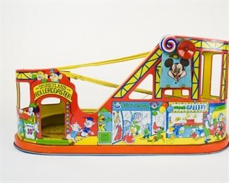 129	J. Chein Tin Litho Disneyland Roller Coaster	J. Chein Tin Litho Wind-up Disneyland Roller Coaster. Mechanical, working; 1 car. Normal wear and scratches. 19"L
