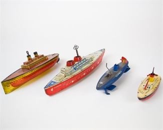 157	Set of 4 Wind-Up Tin Litho Toy Boats	(1) Blue - SSN25 with Red Propeller (1) Red with Gold Bottom (1) Red, White & Blue - Made by Wolverine Supply & Mfg. Co - Pittsburgh PA. All with paint loss and wear consistent with age. (1) White, Red Bottom and Yellow Smoke Stack Longest - 14 1/2"
