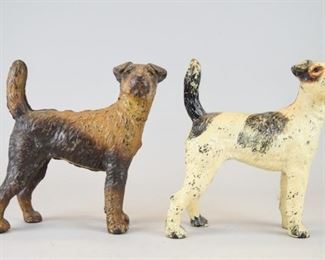 164	2 Jack Russell Terrier Cast Iron Doorstops	2 cast iron dog doorstops Jack Russell Terriers. Each 7 1/2"L x 8 1/4"H. Paint loss to both.
