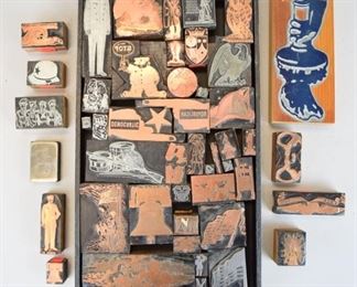 182	Grouping of Americana Printing Blocks	Lot includes many vintage printer's blocks, various sizes, many copper on wood, themes include American flag, patriots, statue of Liberty, Liberty Bell, patriotic wartime blocks, military. Largest 6 3/4" x 2 1/2"
