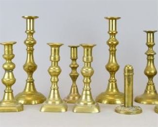 186	Grouping of Brass Candlesticks	4 pairs of brass candlesticks and 4 single brass candlesticks. Tallest pair 10 3/4"H

