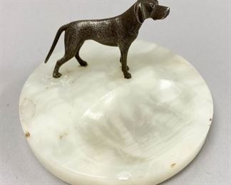 205	English Sterling Dog on Marble Base	Hallmarked English sterling dog, with C & CH, Birmingham maker's mark (possibly C & C Hodgetts), circa 1927. Mounted on marble base, base stamped Made in England. 2"H x 3"-diameter
