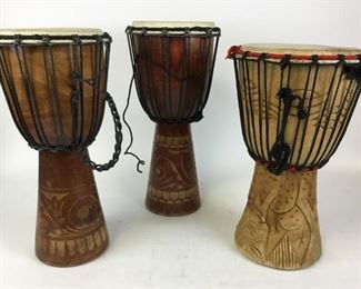 218	3 Djembe West African Drums	With carved decoration. Tallest approximately 20"H
