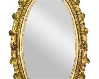 222	Victorian Oval Gilt Mirror	Grape leaf motif on both sides. Top crest festooned with a bunch of grapes. 28.5" W X 61" H
