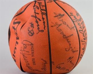 304	1980's Phoenix Sun Team Signed Basketball	A basketball signed by the Phoenix Suns NBA team. Signed in the 1980's. Signatures include Walt Davis and William Bradford. Basketball is slightly deflated and has lost its shape. 9" H.
