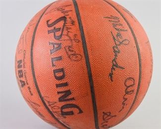 305	1980's Phoenix Suns Signed Team Basketball	A basketball signed by the Phoenix Suns NBA team. Signed in the 1980's. Signatures of significance include Paul Westphal and Alvin Scott. Basketball is in good condition. 9" H.
