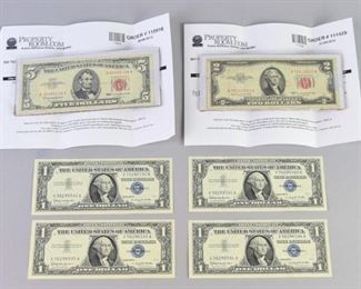 336	Group of US Bank Notes	A group of US bank notes, including a $5 red seal note, a $2 red seal note, and 4 $1 silver certificates in serial number order. All bills are in very good condition.
