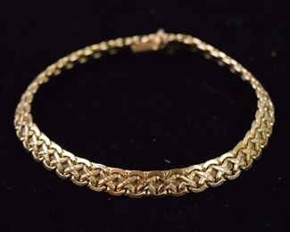 357	14 Karat Gold Chain	A 14 karat gold chain, 7.25" in length. Chain weighs at 15.8 grams.
