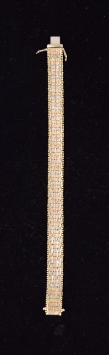 364	14 Karat Bracelet	A 14 karat gold bracelet, weighing in at 22.97 grams. Very good condition. Measures 7.25" in length.
