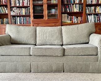 Green woven fabric sleep sofa & loveseat, reupholstered by Calico Corners